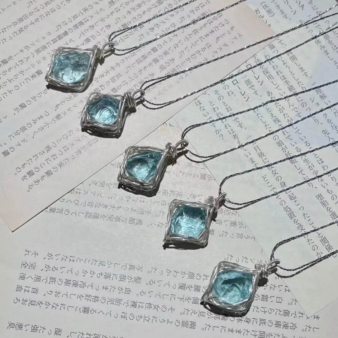This is a handmade blue crystal heart necklace, symbolizing the heartbeat of the world. - DAO&NATURE